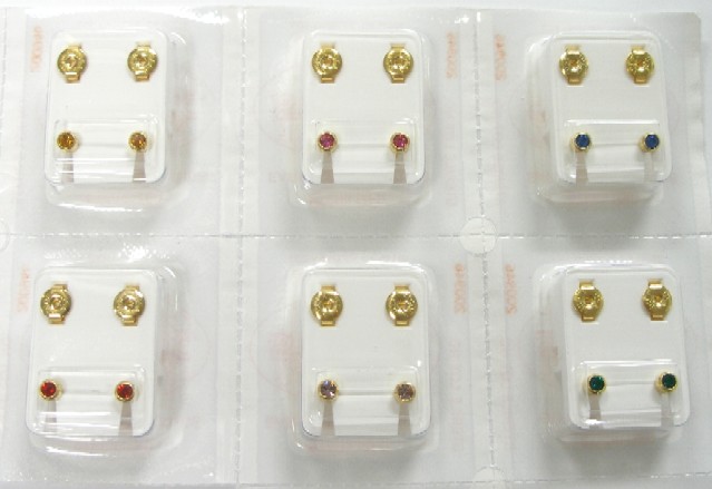 ear piercing studs yellow gold on surgical steel with stones